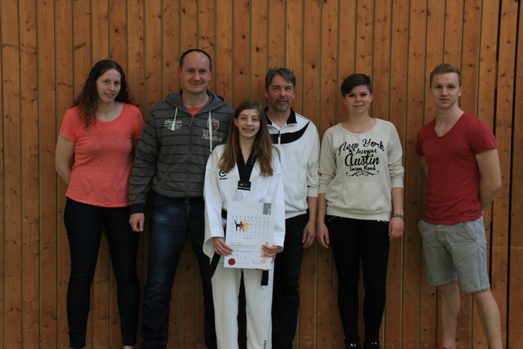 Ann-Kathrin mit Trainern und Freunden.